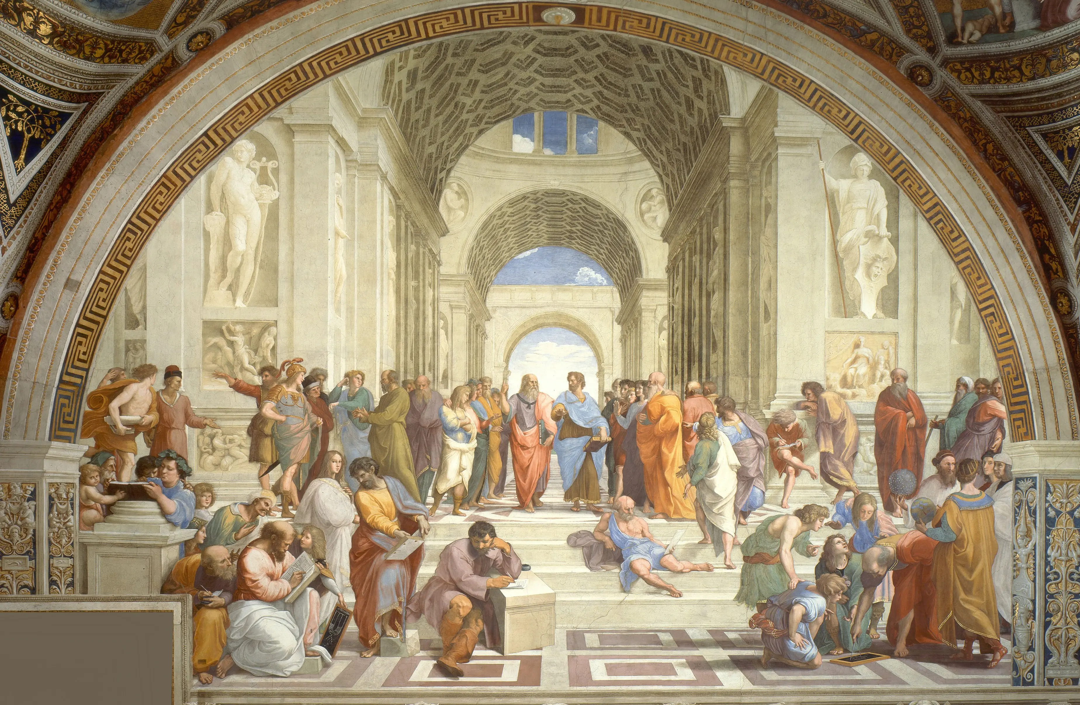 A full-color image of Raphael's fresco, "The School of Athens," depicting a large gathering of ancient Greek philosophers, mathematicians, and scientists in a grand classical, vaulted hall. In the center, the main figures, Plato and Aristotle, walk and gesture. Surrounding them, groups of figures are engaged in discussion, teaching, and contemplation, some writing on slates or scrolls, set against a receding architectural space framed by a large arch and flanked by statues of classical gods.